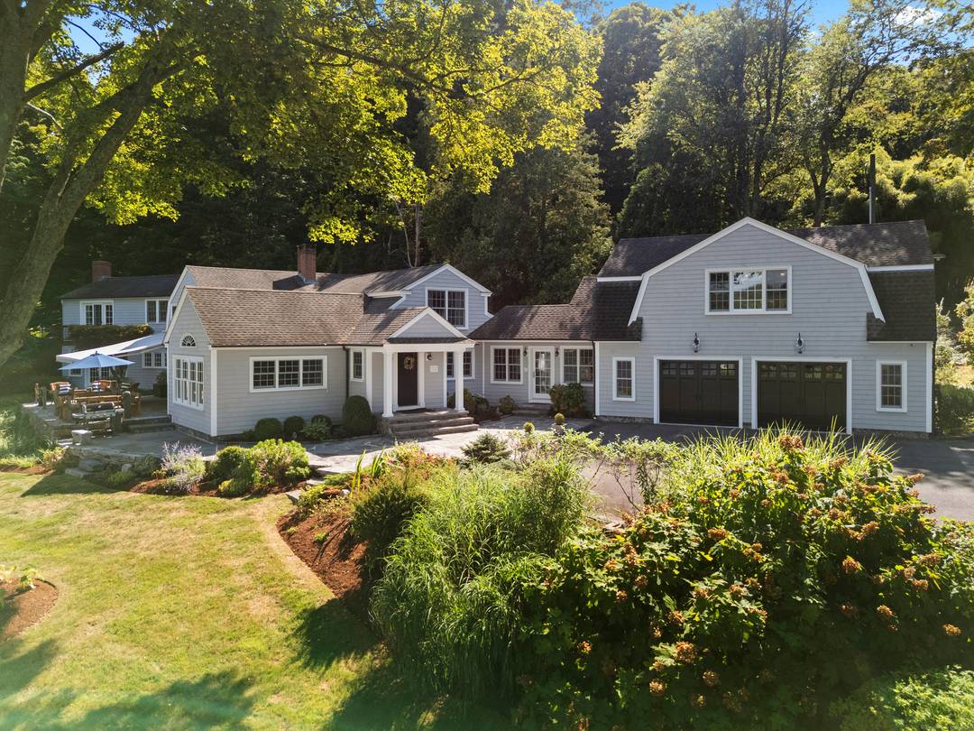 Set along a coveted stretch of the Connecticut River, this stunning, turnkey waterfront compound offers a rare convergence of privacy, protected views, and deep water access just over one mile ...