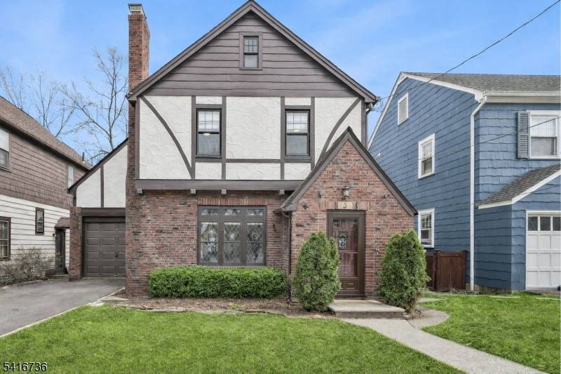 Discover this compelling combination of classic Tudor charm with well executed renovations in this 3 bed 1.