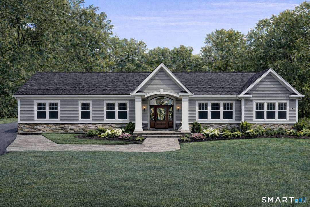 Stunning new construction ranch set on a beautiful level lot, just under an acre.