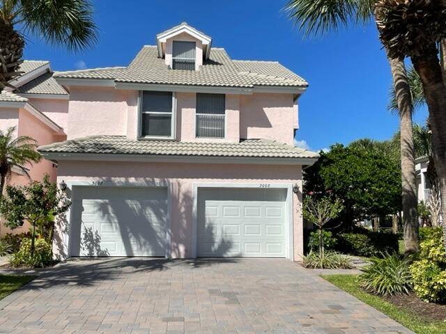 Available 2026 Season ! Walk to the turquoise waters of Jupiter Beach from this 2nd floor, 2 bedroom, 2 bath loft, END UNIT townhouse on the 17th green of the ...