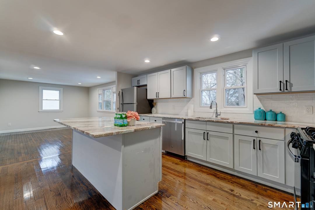 Welcome to 669 Hartford Turnpike in Hamden, CT a spacious and beautifully updated home located in the desirable Spring Glen area.