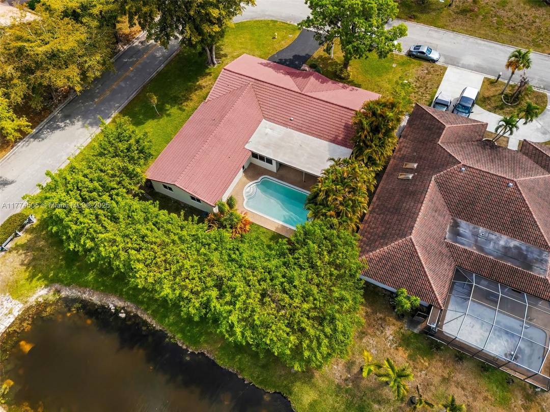 This spacious five bedroom house with a pool is situated in one of the most desirable neighborhoods in Coral Springs.