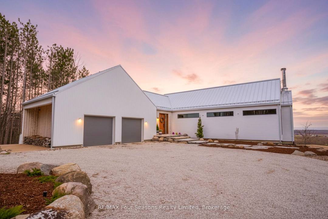 Exceptional Scottish Longhouse custom built by Scot Build Developments on 4 acres features award winning interiors by White Elk Interiors.