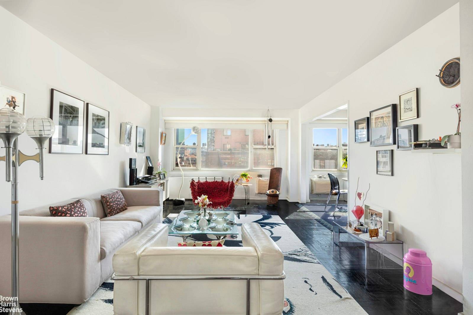 Beauty, space and spectacular natural light are found throughout this large one bedroom convertible to 2 apartment in the mid century Charlton House, Hudson Square's premiere co op.