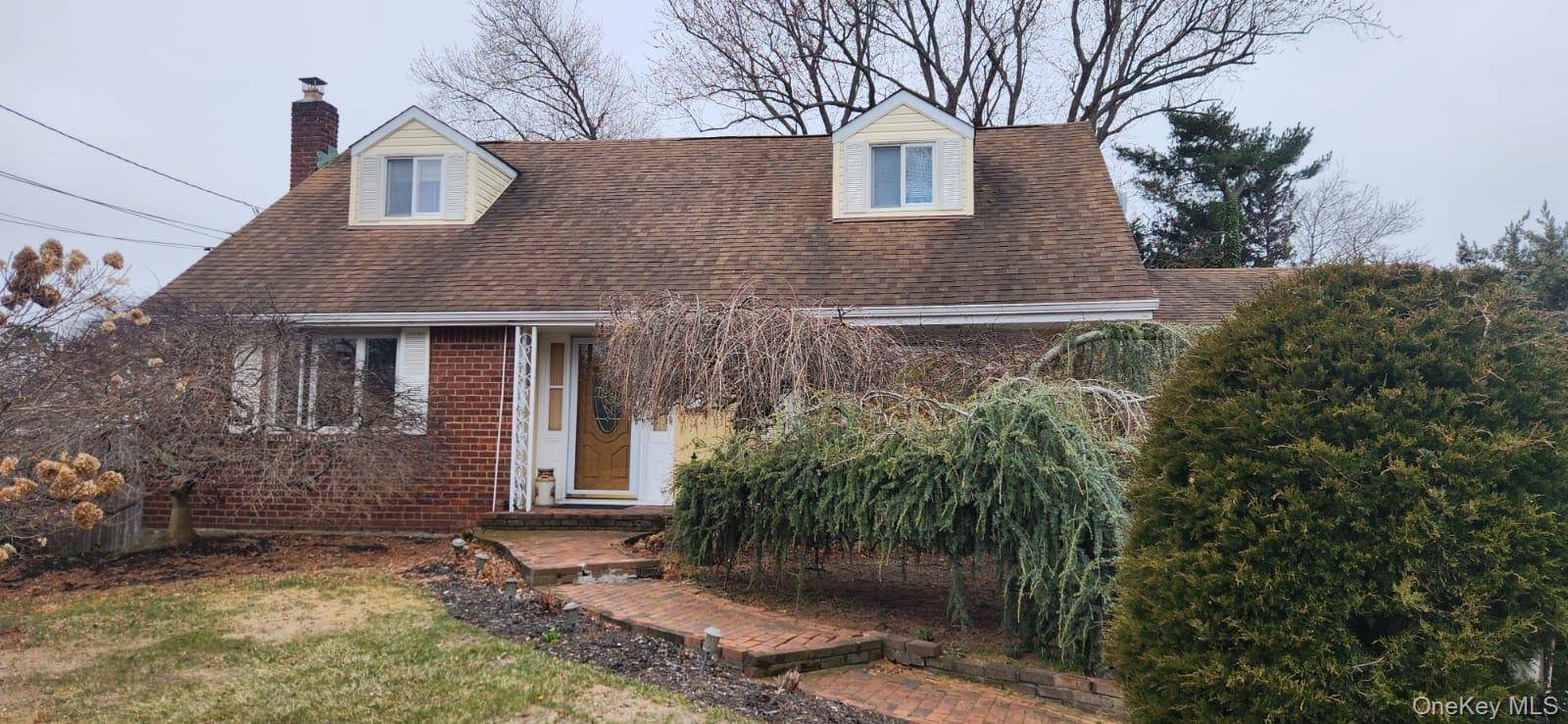 Charming and cozy 4 bedroom, 2 bath Cape located in the heart of East Northport.
