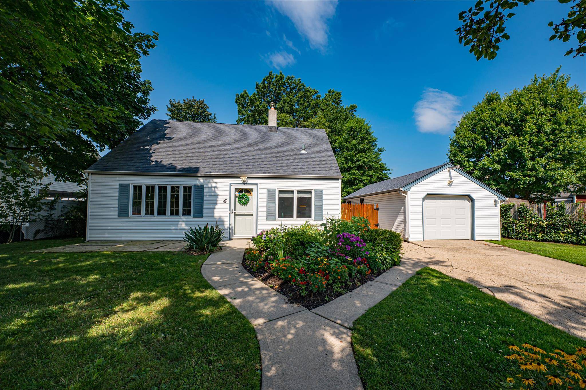 A charming Cape style home with 3 bedrooms, 1 bath, nestled in a peaceful Levittown block.
