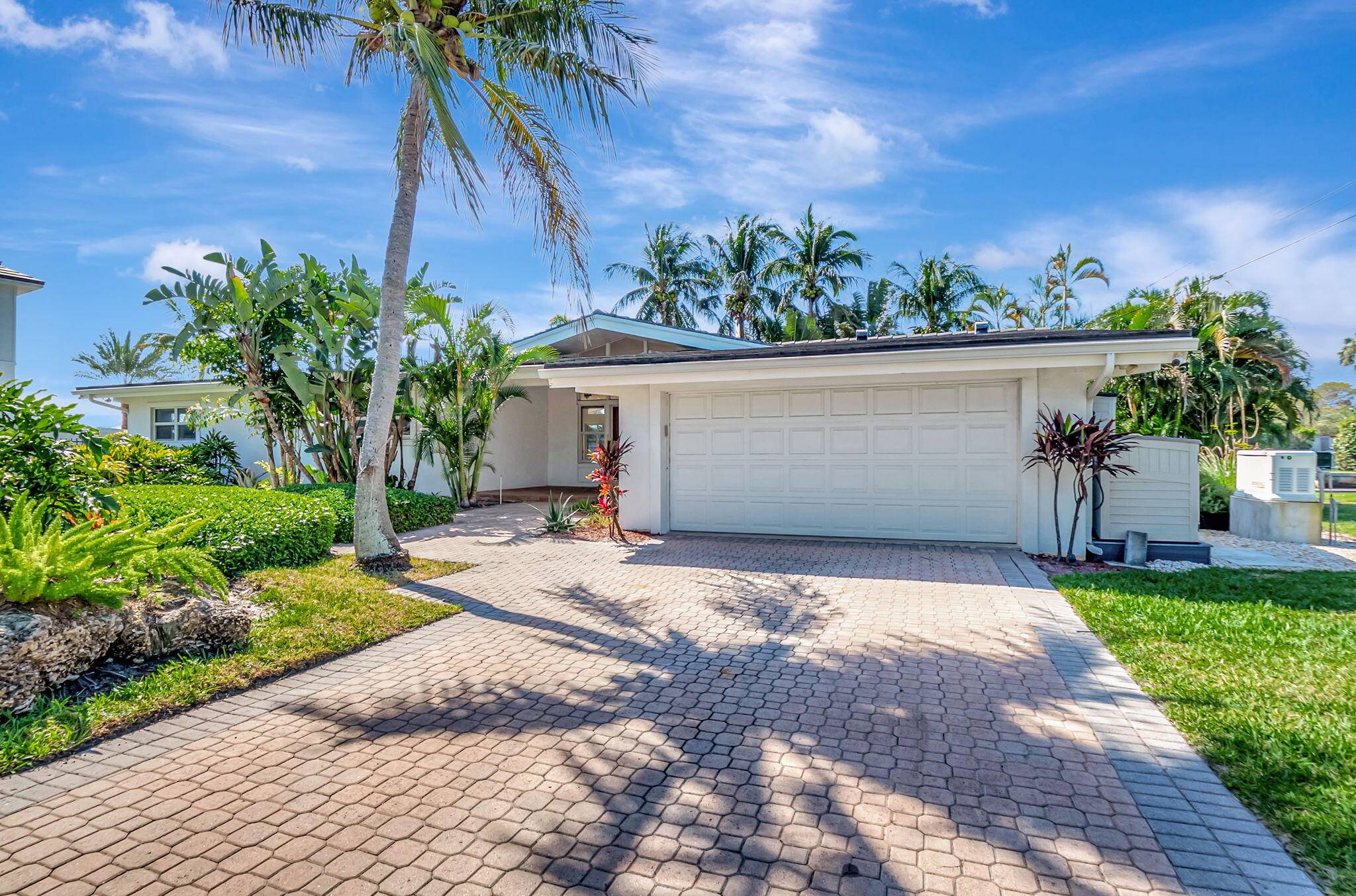 Welcome to an extraordinary opportunity in the heart of Tropic Isles, Delray Beach's premier waterfront community.