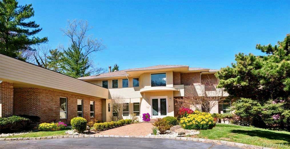 Welcome to 110 A Windsor Gate LUXURY LIVING AT ITS FINEST An Architectural Gem Nestled within an Exclusive Private Cul de Sac in The Village of Lake Success.