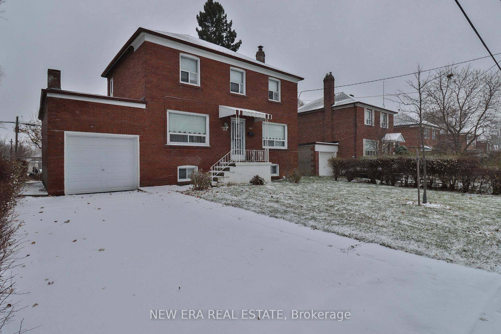 Charming brick home with centre hall plan.