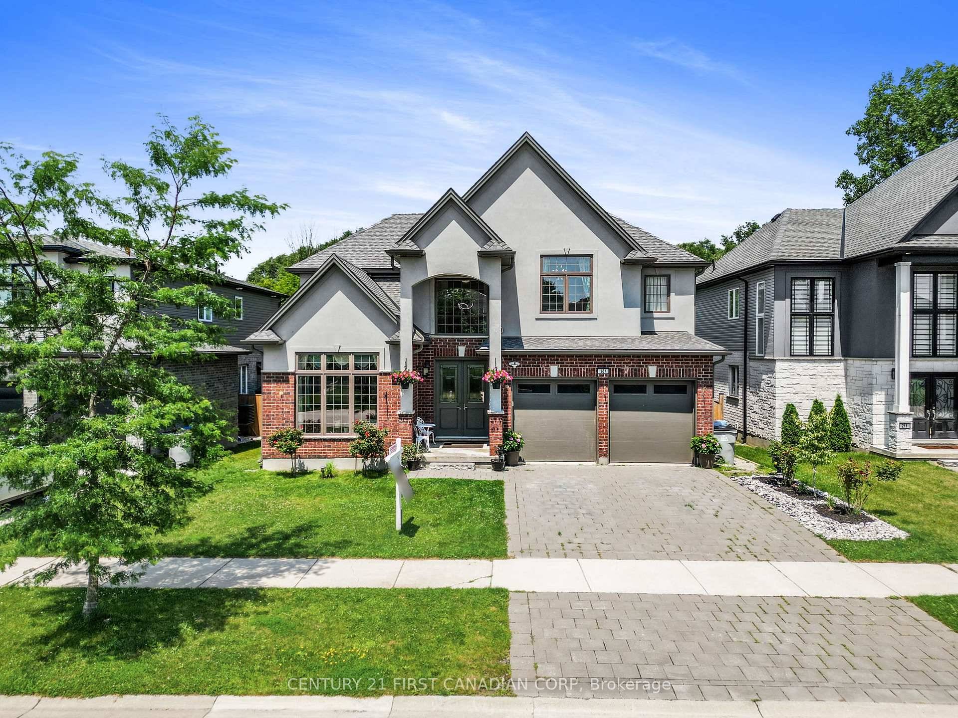 Your Komoka dream home ! 3150 sqft 2 stry incl 900 sqft finished lower lev in a park like setting.