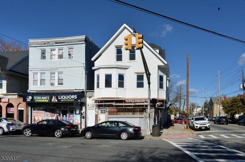 LOW TAXES 4895 Mixed Use Building Offers Fantastic Income Potential And Is Situated On A Corner Lot For Maximum Visibility And Accessibility.
