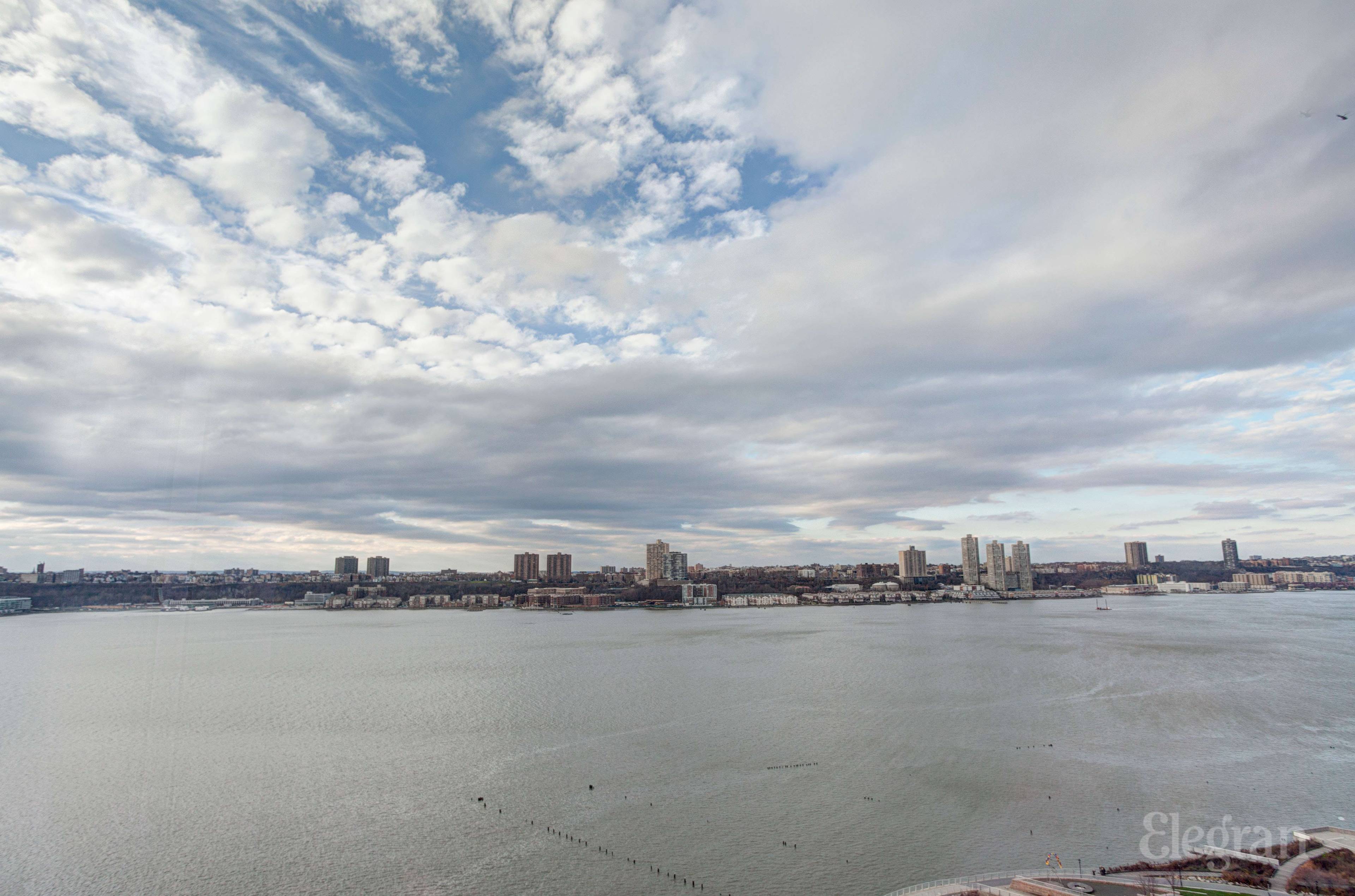Upon entering 19A at One Riverside Park, you will immediately be blown away by the direct, unobstructed river views in this spacious home.