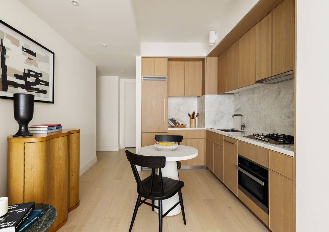 Luxury Alcove Studio Home with 10' floor to ceiling windows and an ideal layout !