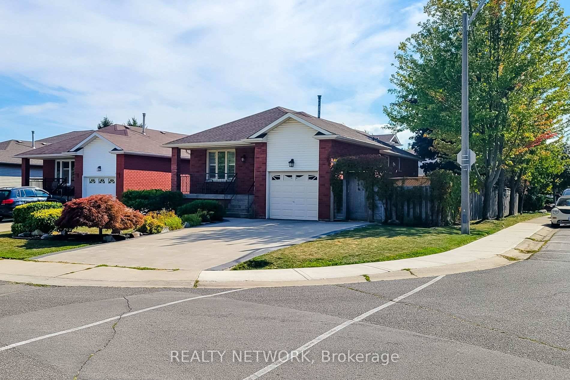 This elevated ranch offers an open concept main floor with plenty of natural light.