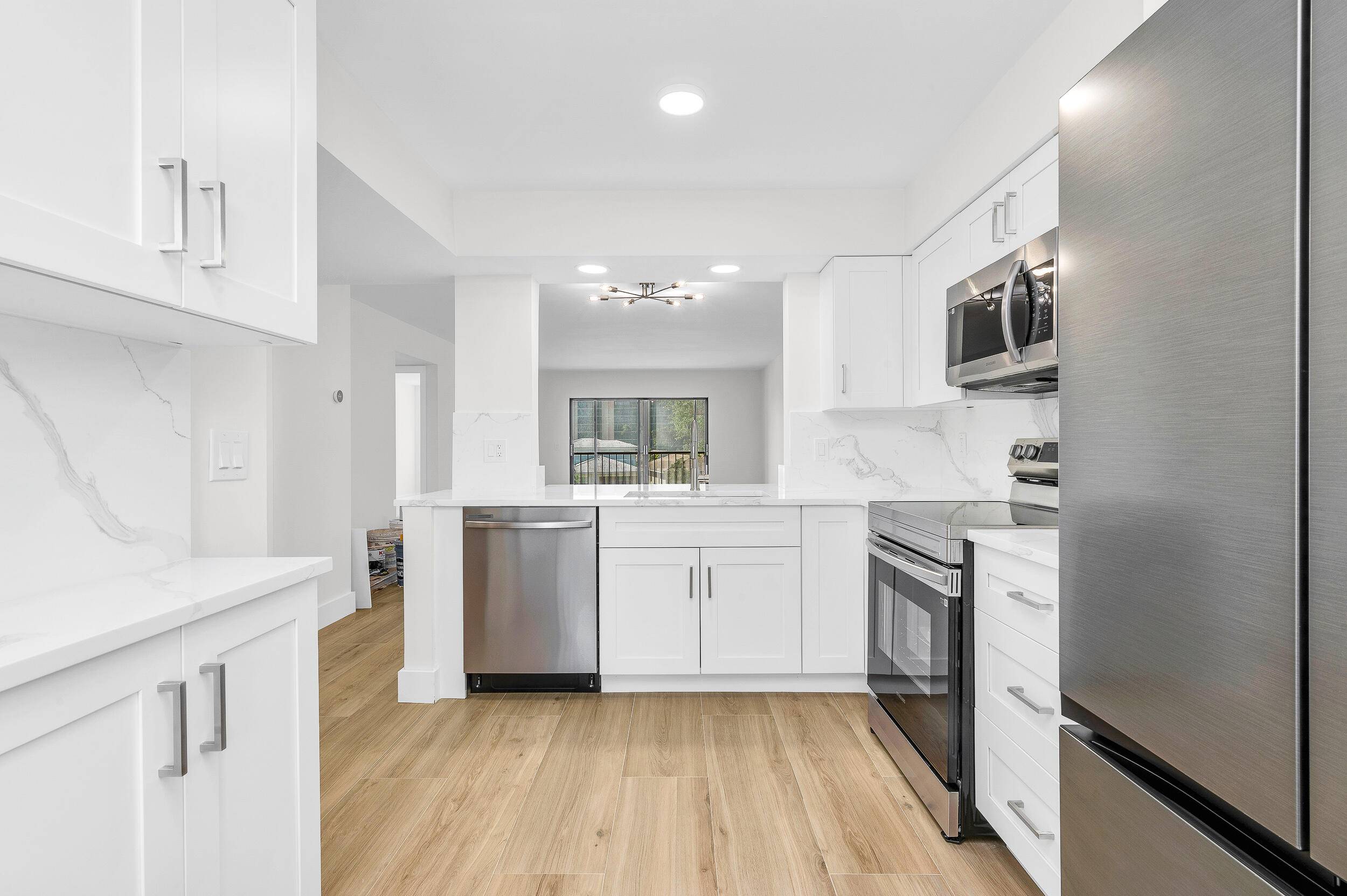 Newly renovated 2 2 corner unit in the heart of Delray Beach.