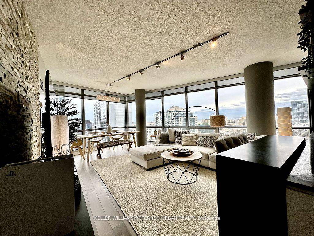Stunning Lake Views amp ; Natural Light in this Corner Suite with Both South and West Views !
