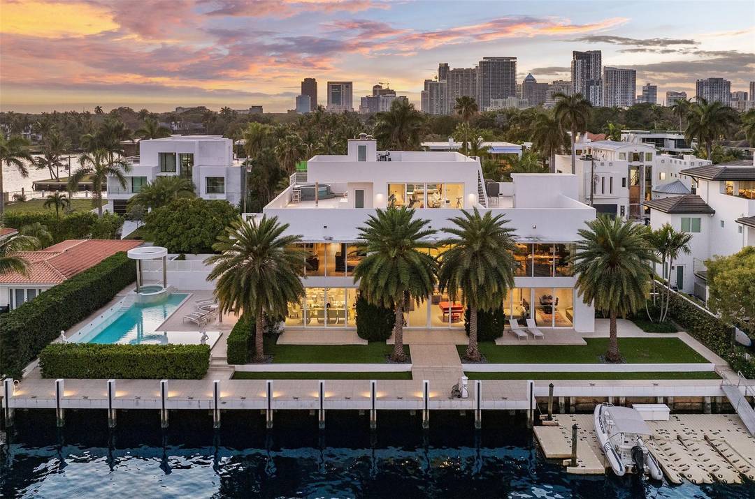 Welcome to this stunning Greek Islands inspired white concrete 3 story home with 150' concrete dock designed by renowned Architect Tuthill amp ; built by esteemed Lavallee Builders.