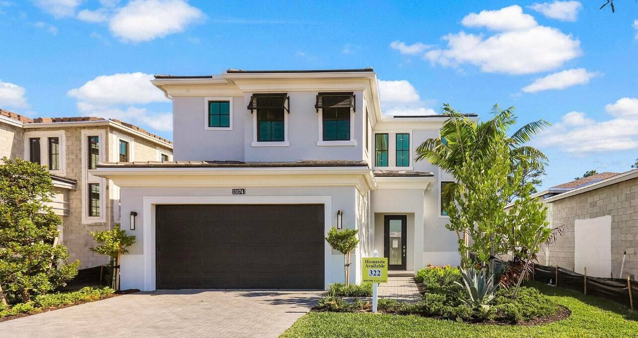 STUNNING El Greco model with custom pool in the highly desired Artistry of Palm Beach.