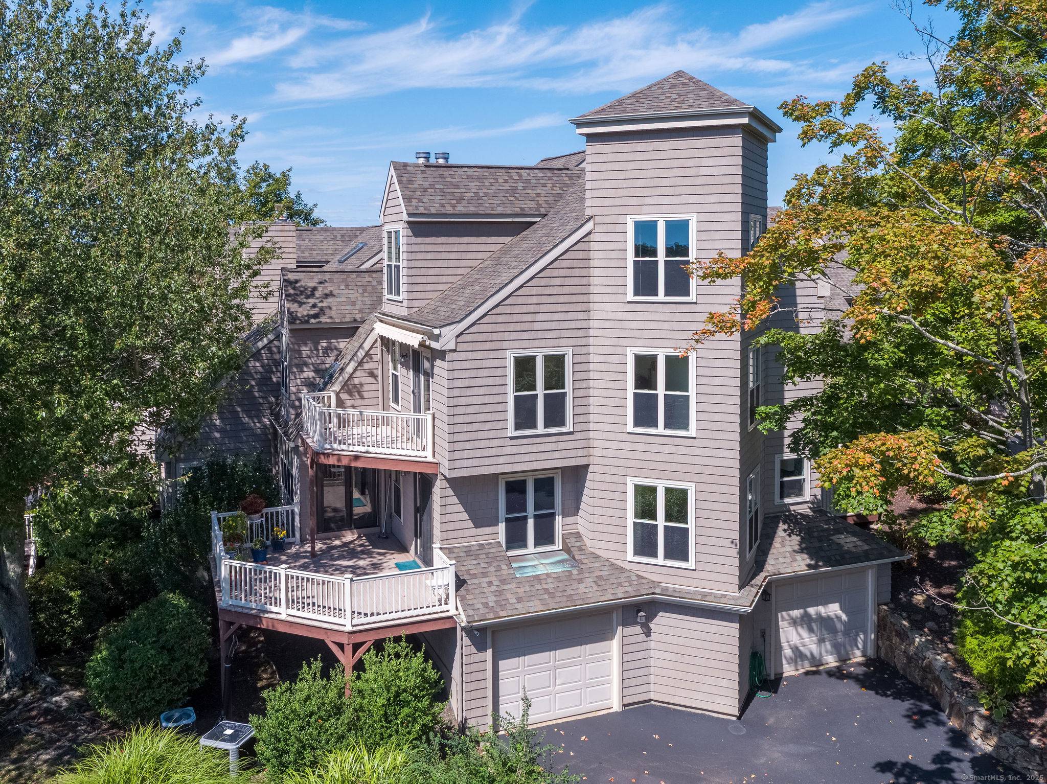 Stunning waterfront end unit with panoramic southerly views over the Branford River !