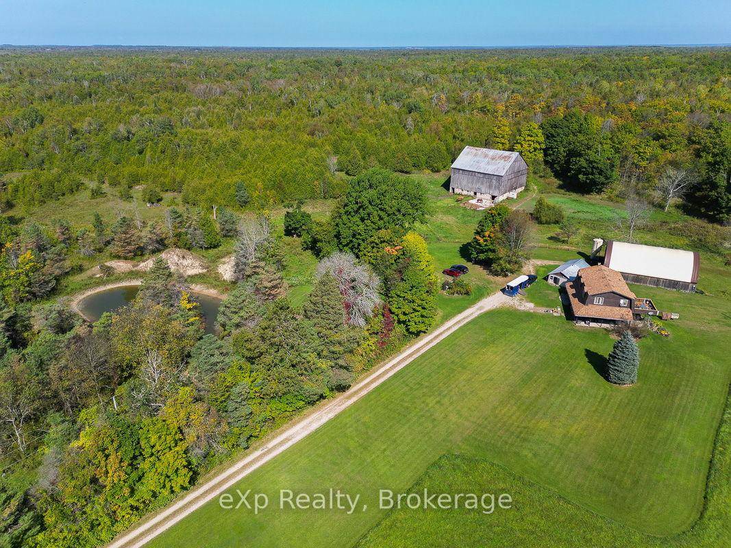 Located between Lake Huron and Georgian Bay at the base of the Bruce Peninsula, this 144 acre property offers a solid mix of productive land, wooded areas, and open space.