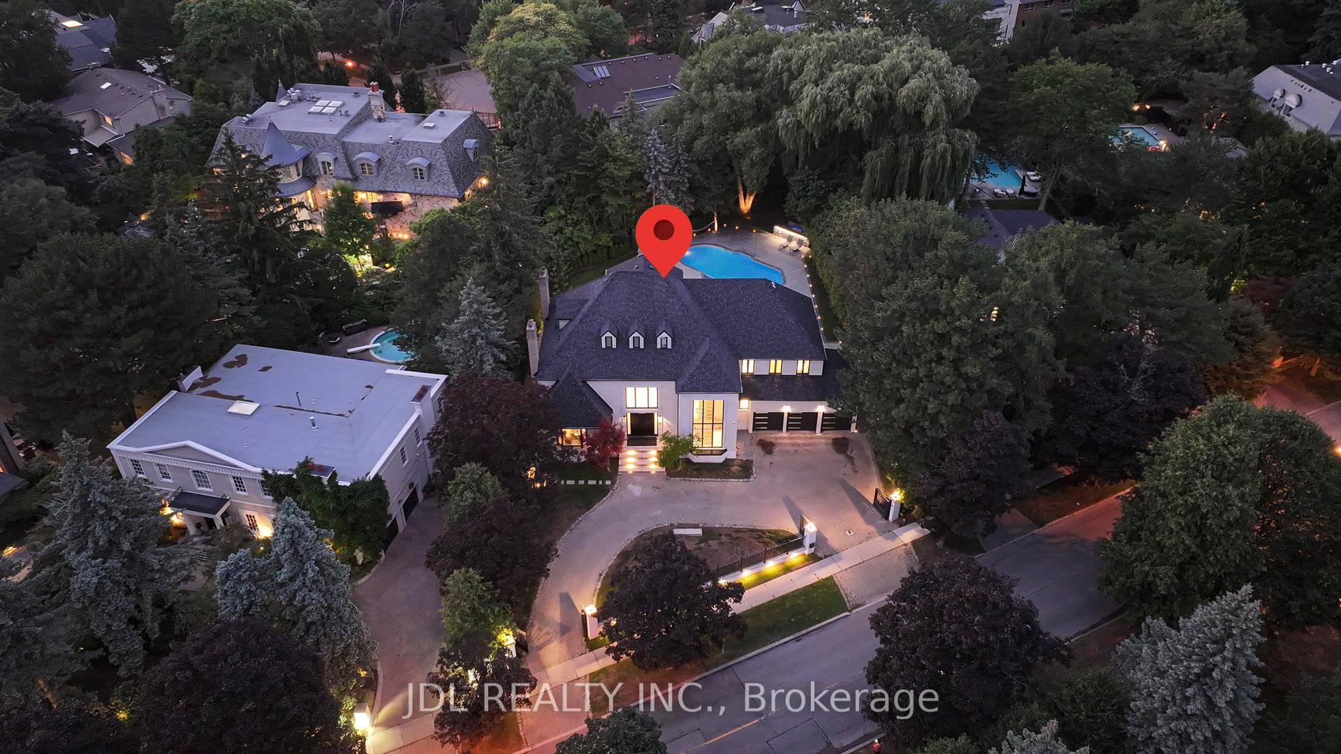 Gorgeous 3 Car Garage Mansion nestled On Fifeshire Rd.