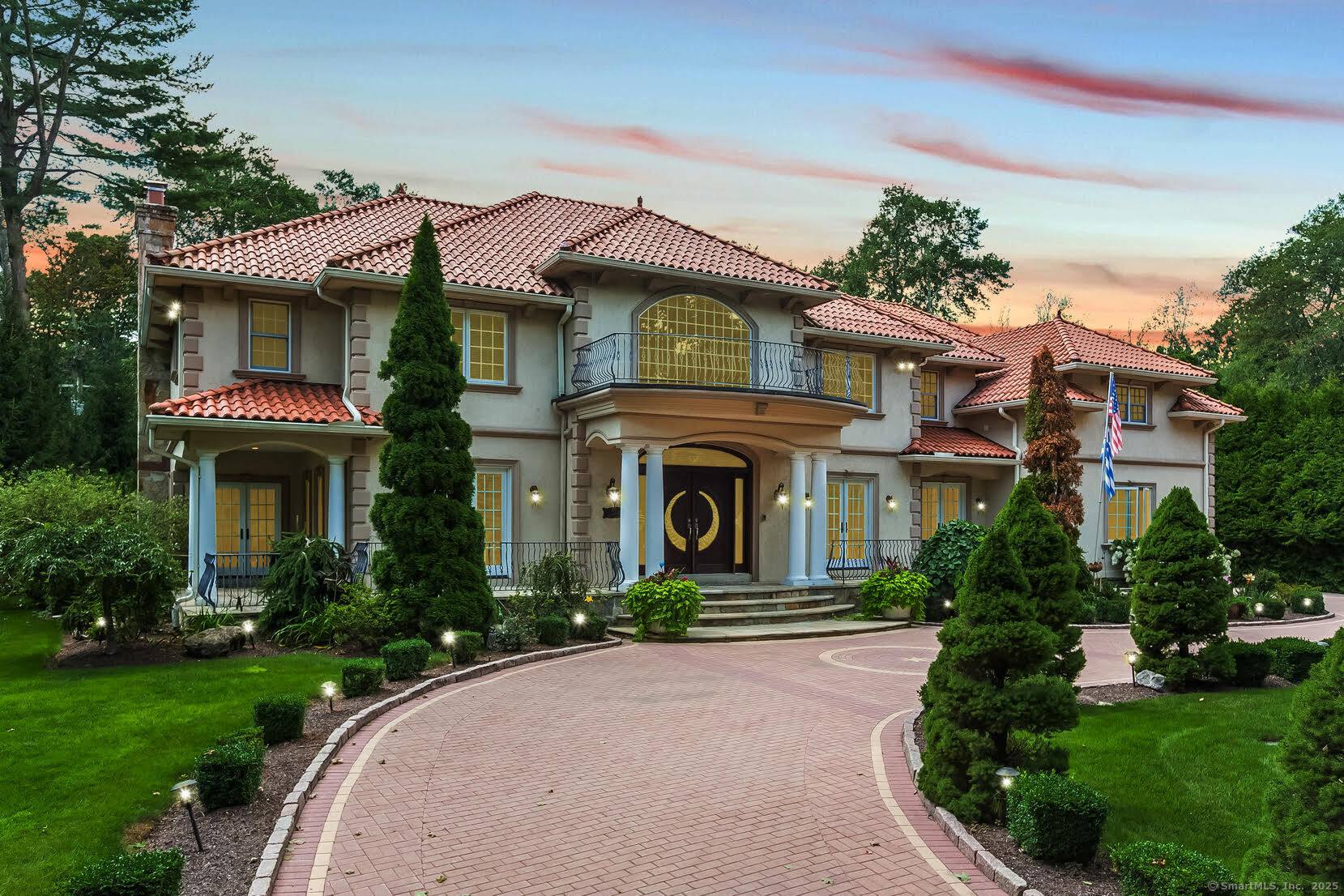 This stunning architectural masterpiece, nestled in the prestigious Silvermine neighborhood, offers nearly 8, 000 square feet of unparalleled luxury.