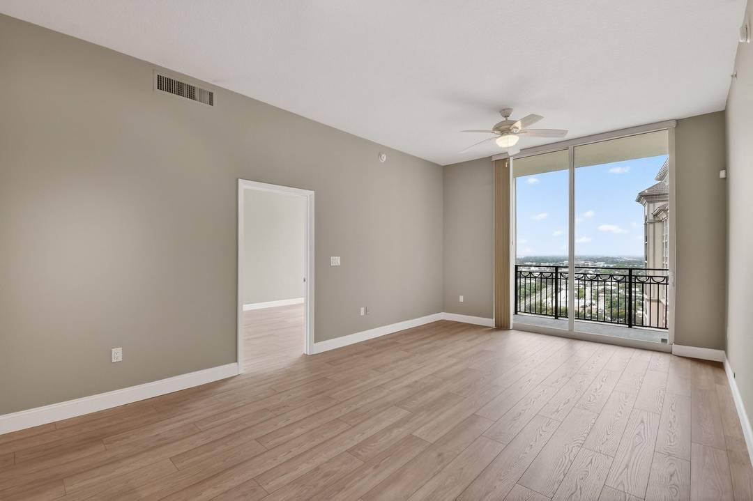 Rarely available renovated penthouse offering southeast exposure and sweeping coastal views in the heart of Downtown West Palm Beach.