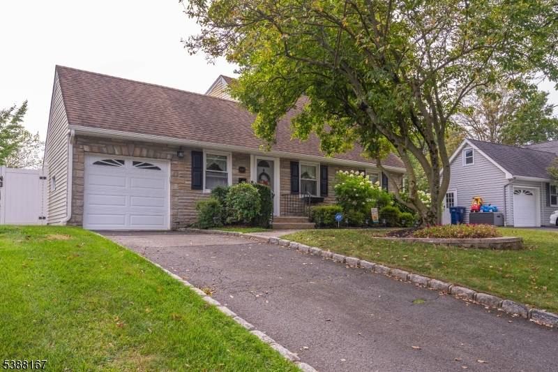 Welcome to this charming Cape Cod home that blends comfort, functionality, and plenty of space for everyday living.