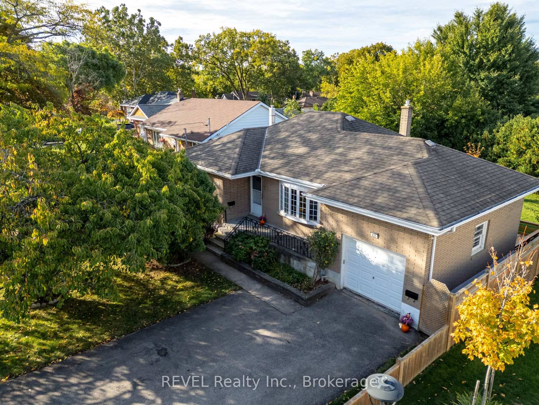 This solid brick, north end bungalow was built in 1953 and offers a single attached garage which has a ceiling height of 11 feet !