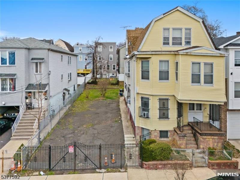Charming Two Family Home in Revitalizing Urban Neighborhood !