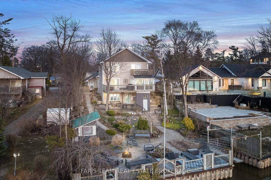 Top 5 Reasons You Will Love This Property 1 Exceptional riverfront property featuring four self contained units, ideally located just minutes from the main beaches in the thriving community of ...