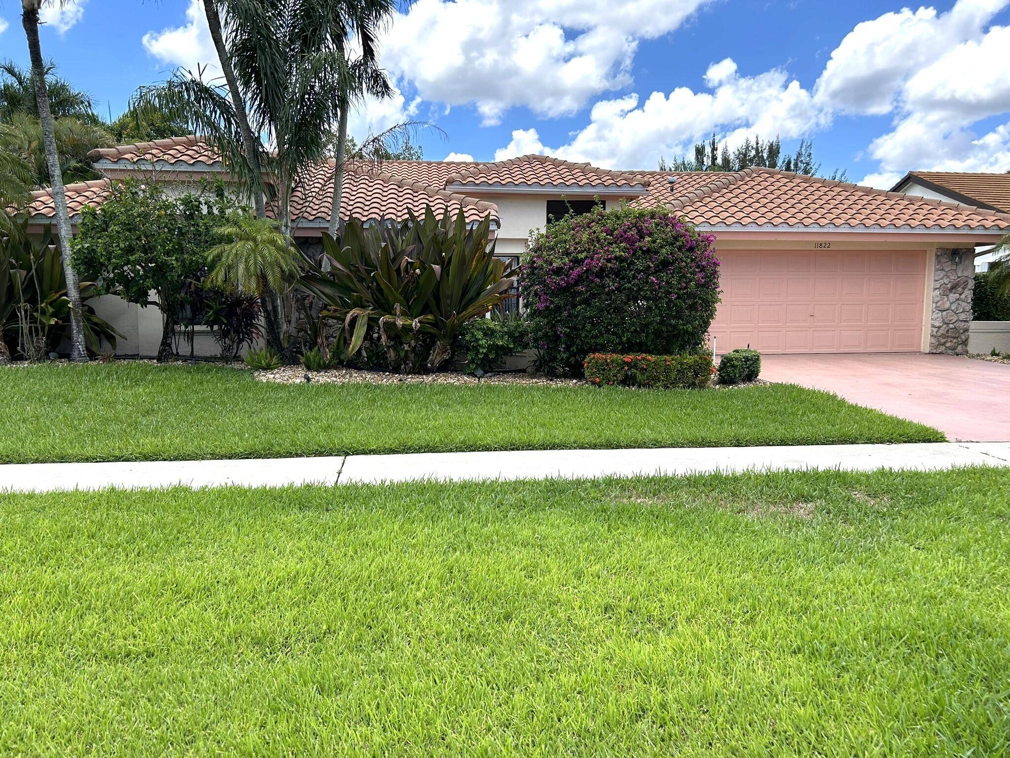 Beautiful 4 BR 2 Bath Pool home in the highly desirable Boca Raton community of Island Lakes at Loggers Run with low HOA fees.