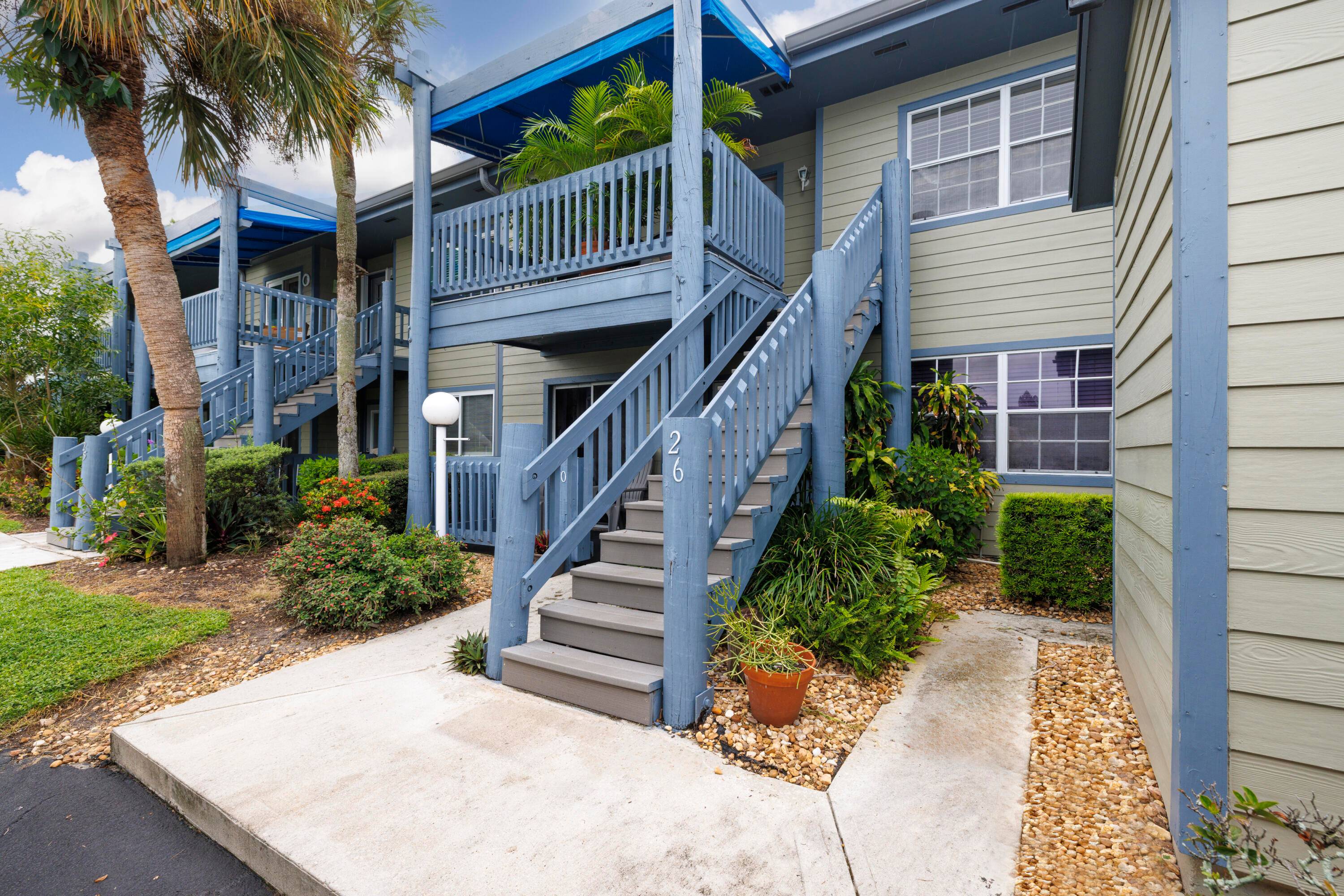 Step into this cozy Florida light bright 2nd floor, 2 bedroom 1 bath condo boasting 13 ft cathedral ceilings, plus two fabulous porches with back deck over looking Warner Creek ...