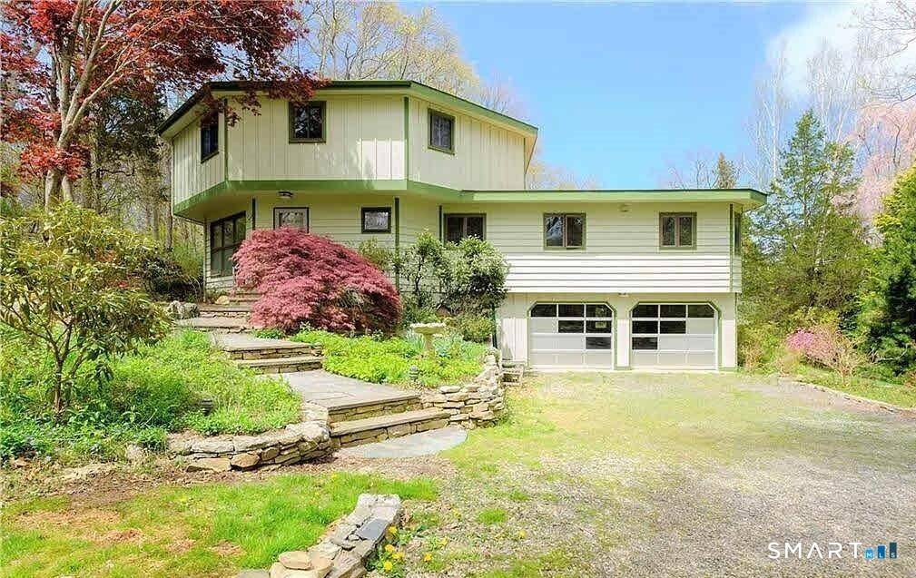 Quiet tranquil setting with tiered decks and slate patios to enjoy the sounds of nature.