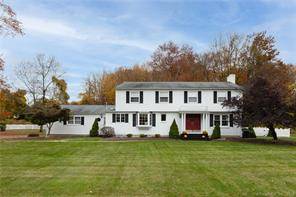 Elegance and stunning curb appeal will pull you into this well maintained colonial home, tucked away in a level, walkable neighborhood.