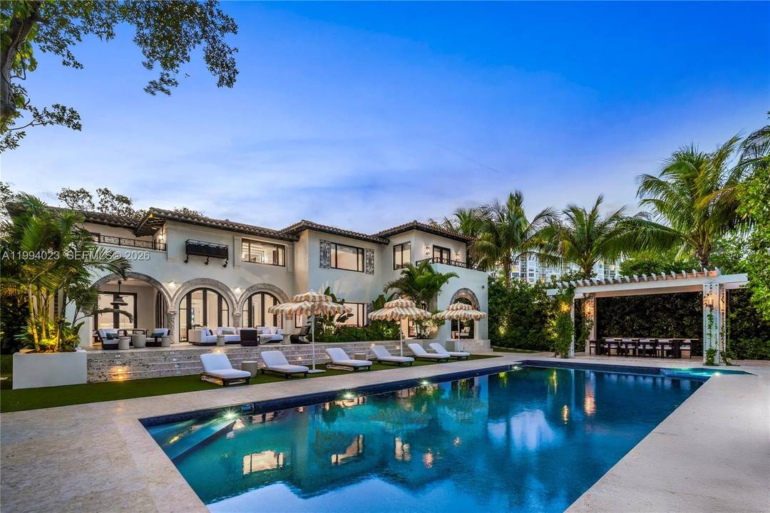 Grand Mediterranean estate by famous architect, Carlos Schoeppl, completely remodeled and upgraded for opulent waterfront living !