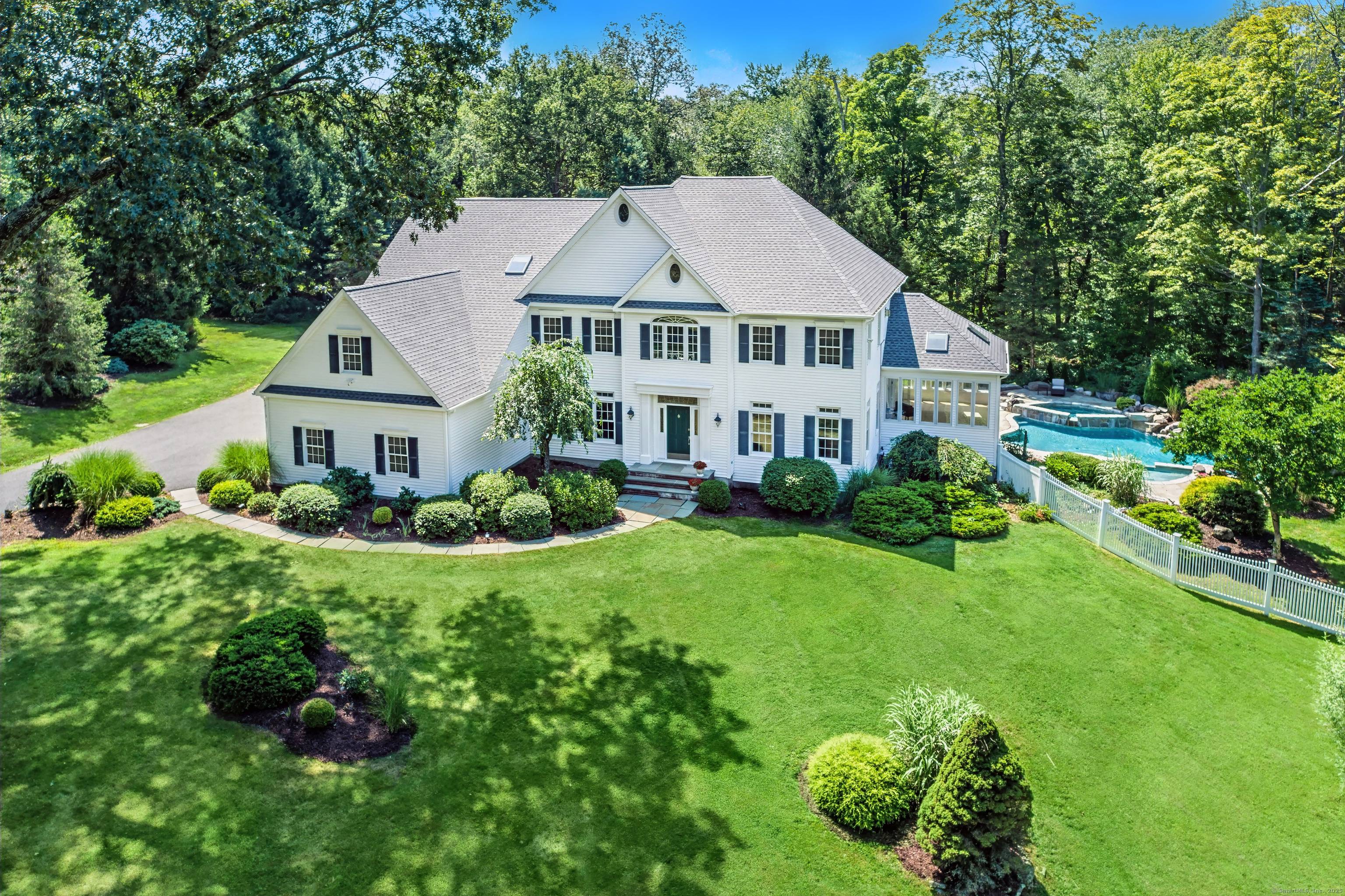Beautifully appointed residence perfectly sited on a private cul de sac bordering 26 acres of a tranquil open space preserve.