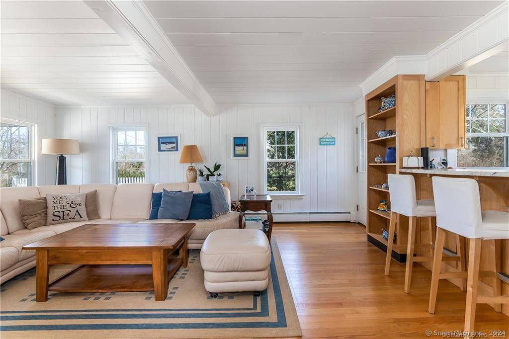 Spend your winter is this absolutely charming a pristine home just steps from the beach.
