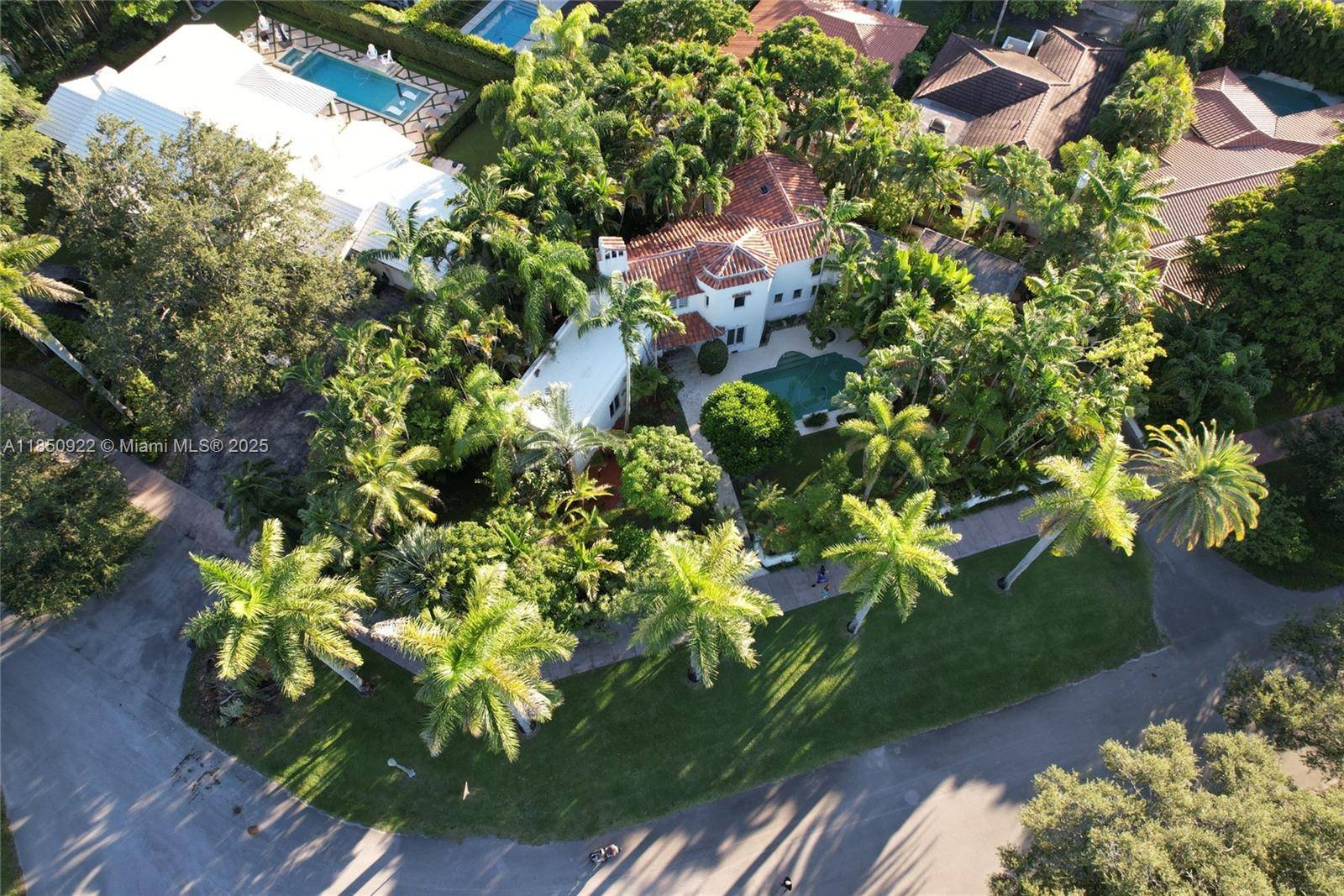 Historical de Garmo estate set on a quiet cul de sac across Ferdinand Park with 177 feet of frontage.