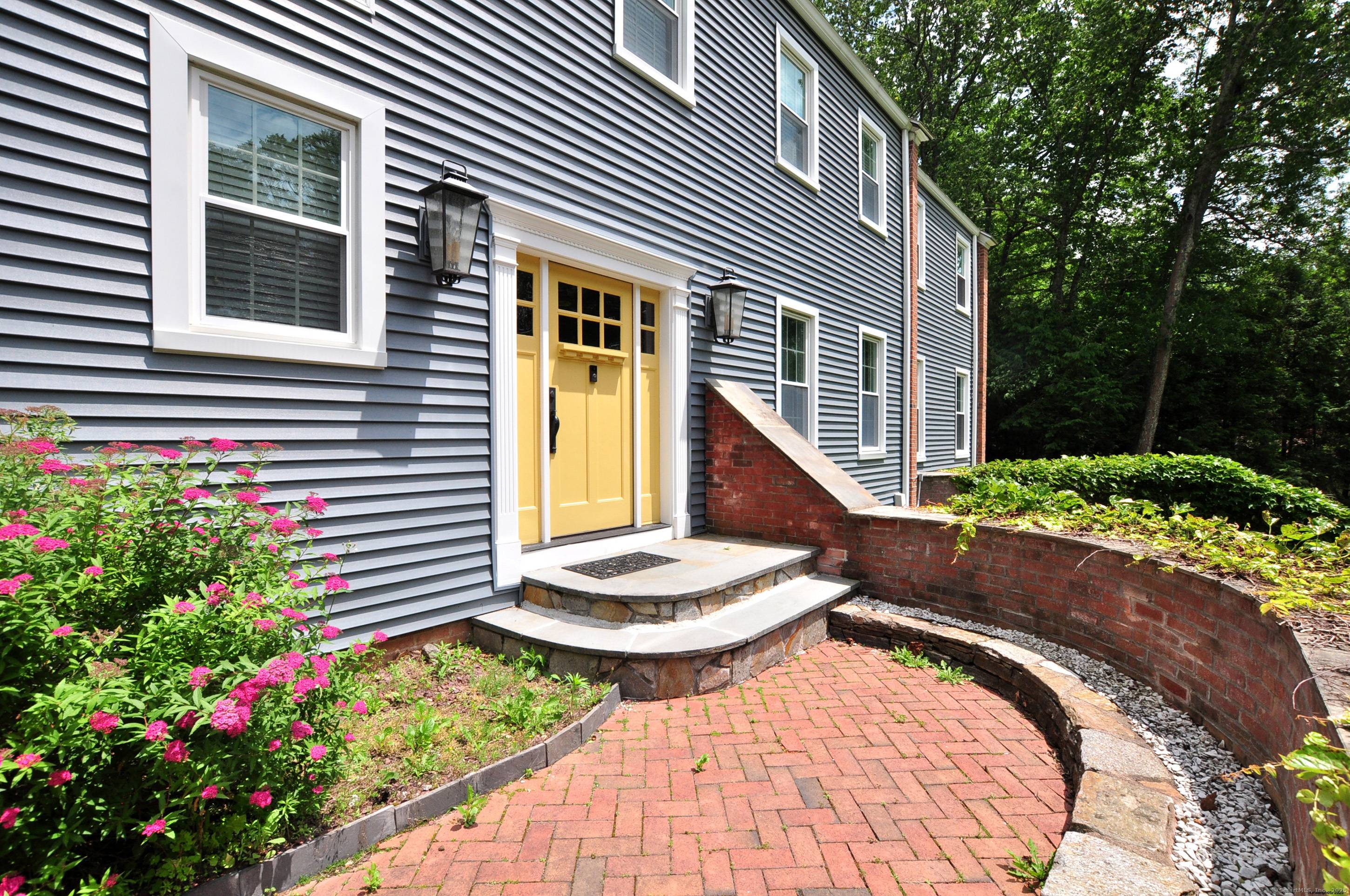 Welcome home to this beautifully updated North Granby gem, majestically set on 2.
