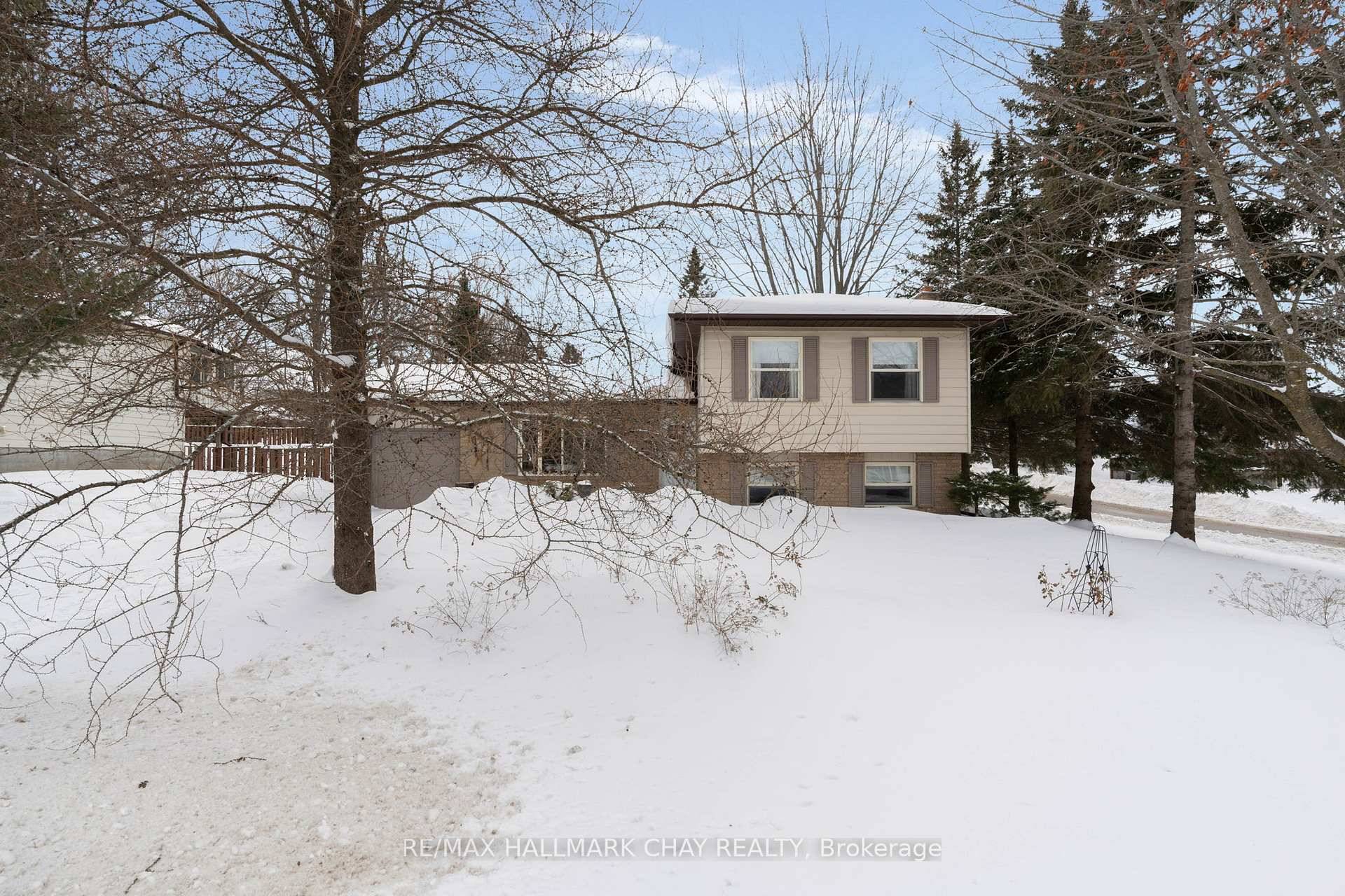 PRESENTING 57 Indian Arrow Road in Barrie's east end community of exclusive homes on large mature lots, just steps from the north shore trail along Lake Simcoe.