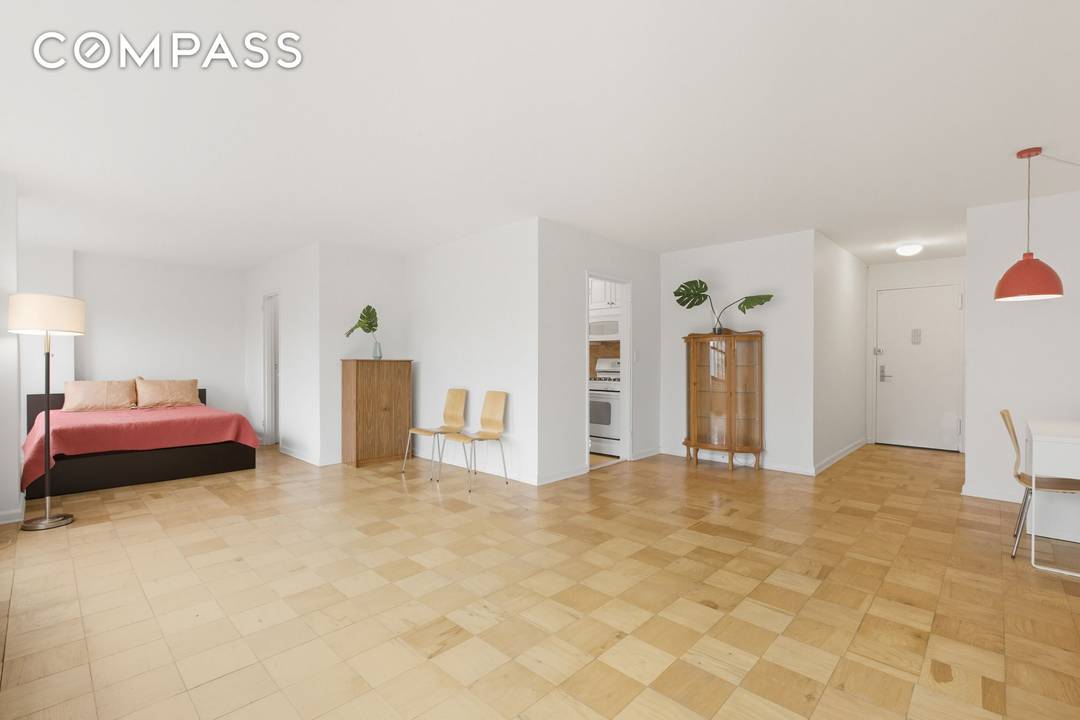 JUMBO SOUTH FACING STUDIO WITH TONS OF LIGHT AND AIR !