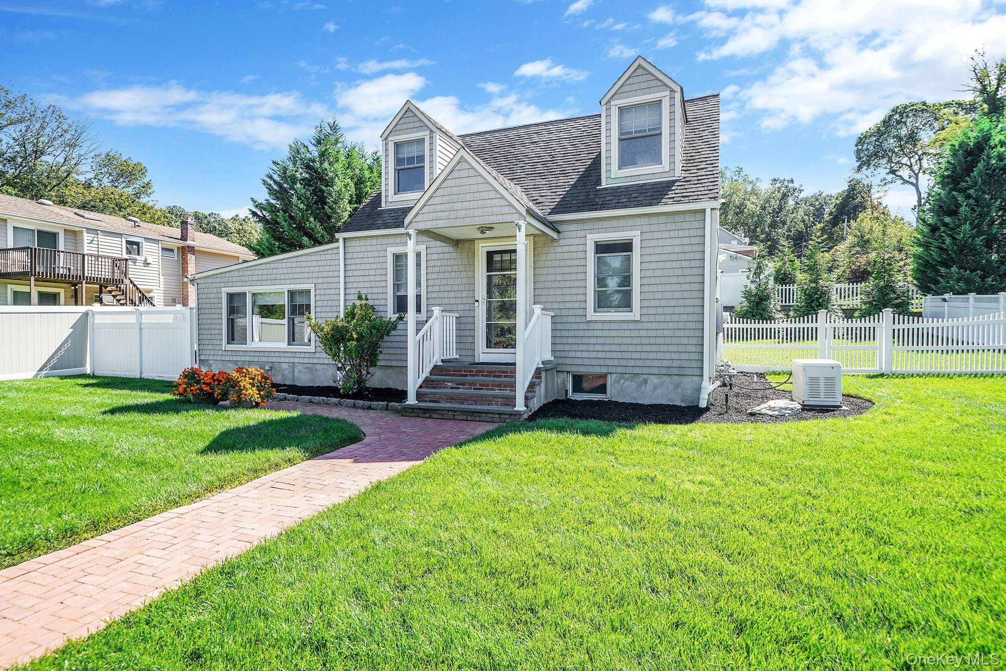 Welcome to this beautifully maintained Cape style home situated on a spacious 100 x100 corner lot in the heart of Kings Park.