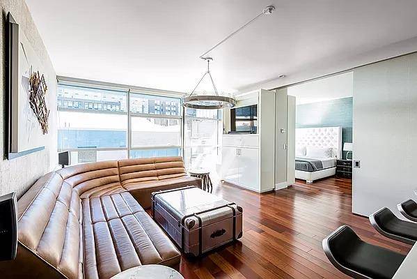 Fully furnished designer showpiece one bedroom in the incomparable Chelsea Modern Condominium !