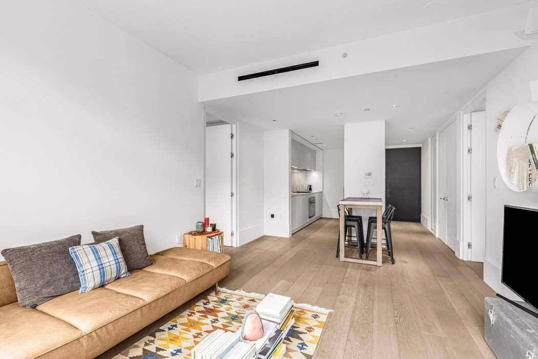 Welcome to Unit 503 at The Oosten, a thoughtfully designed two bedroom, two bathroom apartment featuring a generous layout that maximizes comfort and efficiency.