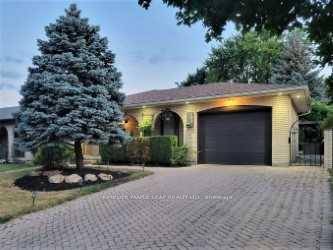 Welcome To this Lovely 4 Level Backsplit Featuring 3 1 Bedrooms And 3 Bathrooms, An Attached Garage With a 4 Car Driveway !