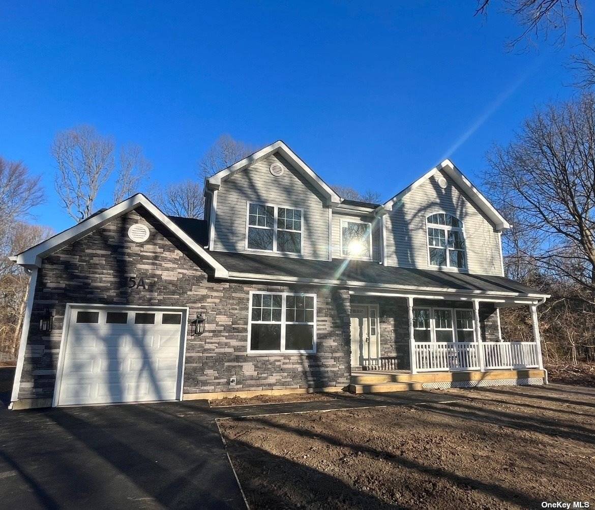 Welcome home to this gorgeous new construction home nestled on an acre of property in well desired area of Centereach.