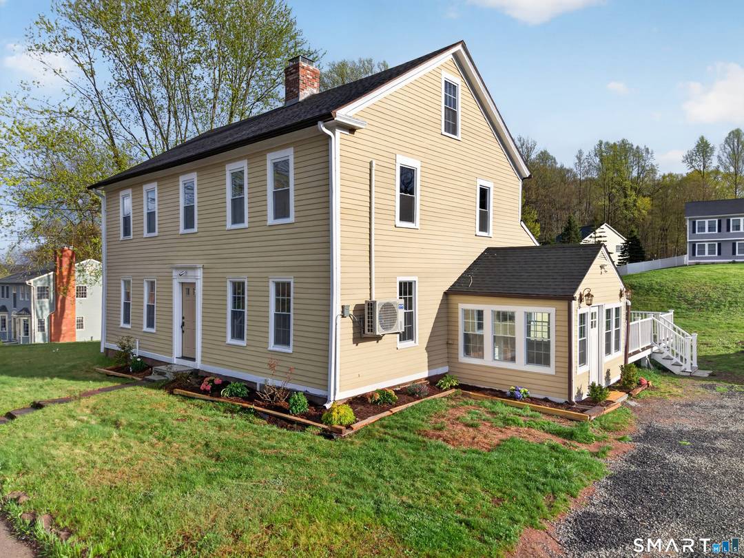 Step into timeless charm with this beautifully renovated 1803 Colonial at 380 Main St in Meriden.