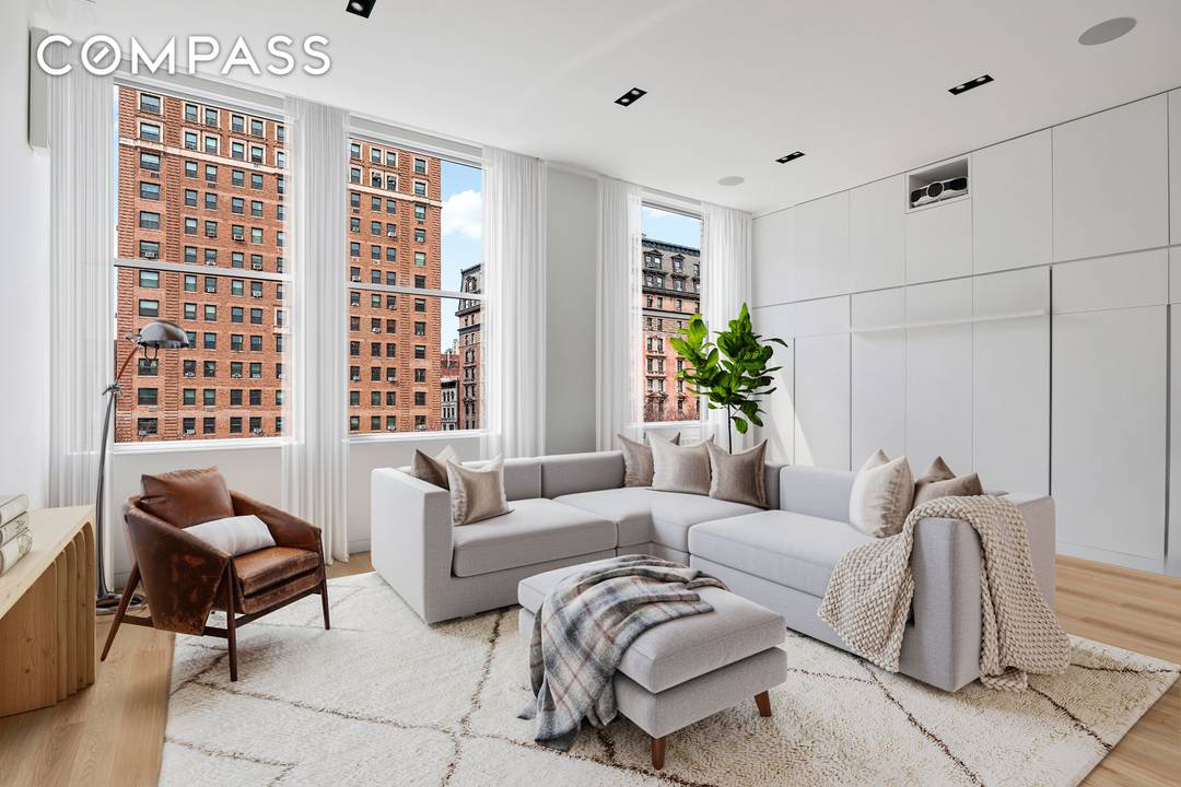 CHIC DESIGNER LOFT WITH VIEWS This expansive 4, 100 square foot loft offers breathtaking North, South, East and West views, including Union Square, the Chrysler Building and panoramic cityscapes.