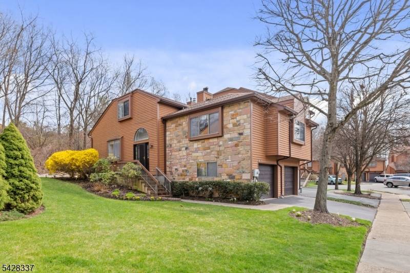 Welcome to 25 Flintlock Terrace in Rockaway an impeccably updated, move in ready end unit townhome offering the perfect blend of privacy, modern upgrades, and low maintenance living.